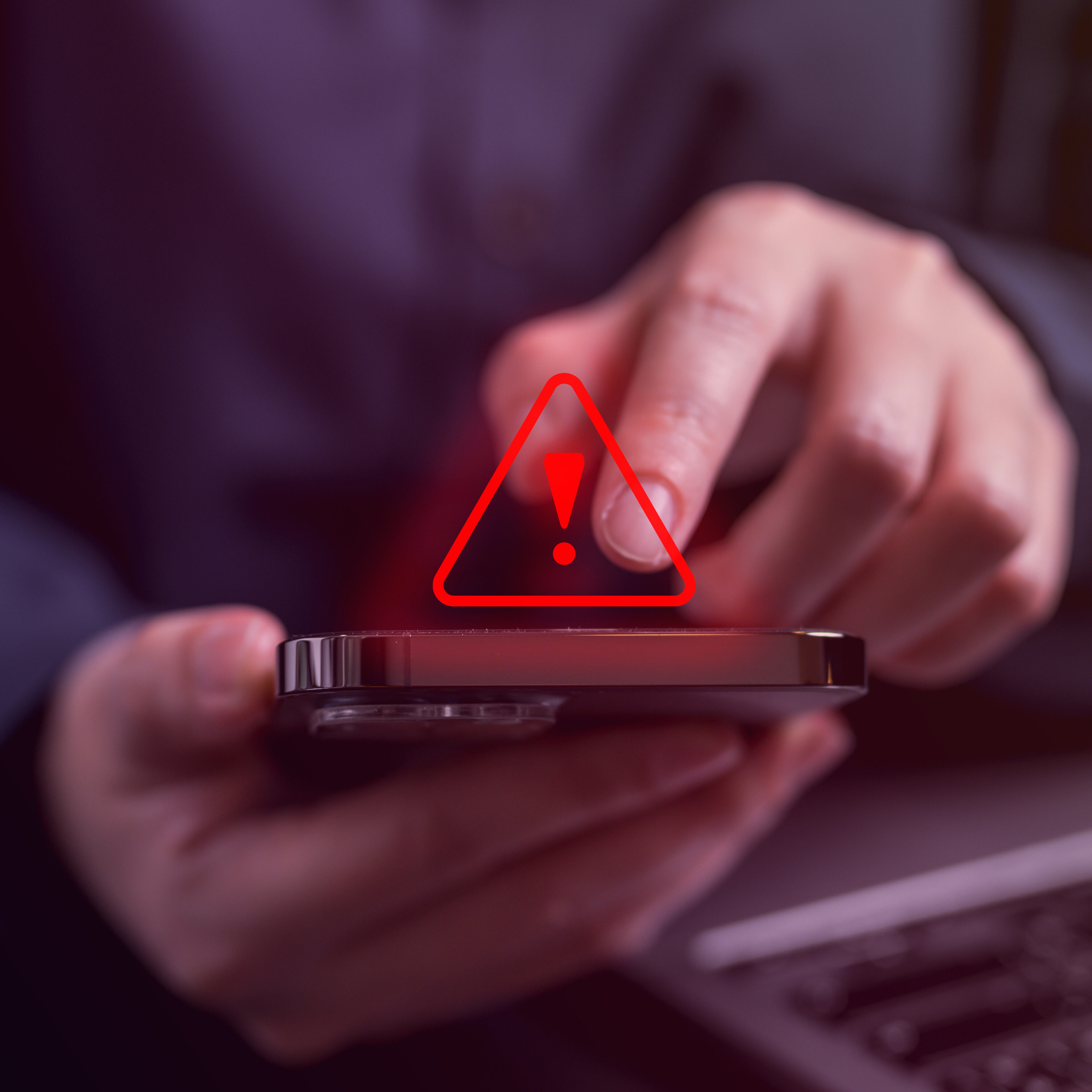 People with warning notification and spam message icon on mobile phone